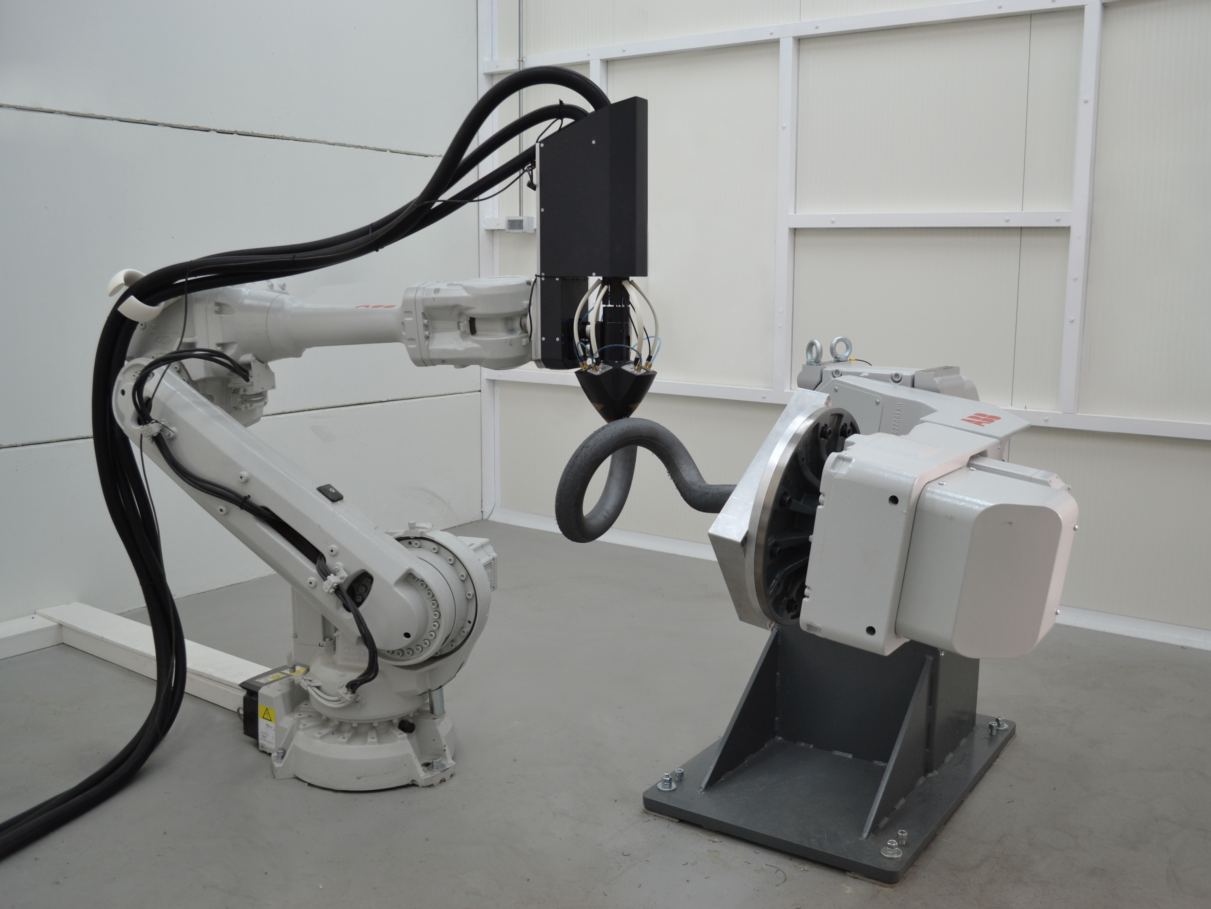 
                                Meltio Engine Robot Integration
                            